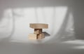 Stack wood cube disc platform podium on white light and shadow copy spase background. Minimal empty display product presentation Royalty Free Stock Photo