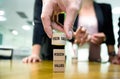 A stack of wooden cubes sow the words values, mission, vision and goals.