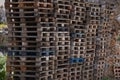 Stack wooden pallets for industrial and for transporting building materials Royalty Free Stock Photo