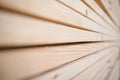 Stack of wooden planks forming a textured background in a construction workshop Royalty Free Stock Photo
