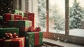 Stack of Wrapped Christmas Presents on Windowsill with Snow Falling Outside Royalty Free Stock Photo