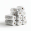 Stack of wrapped white rolls of material, likely bubble wrap or insulation Royalty Free Stock Photo