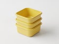 Stack of yellow containers isolated on white background Royalty Free Stock Photo