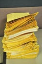 Stack Of Yellow Folders On The Table