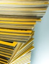 Stack of yellow monthly magazine