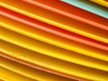 A stack of yellow and orange plates Royalty Free Stock Photo