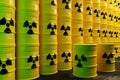 Stack of yellow radioactive waste barrels in disposal zone or final storage