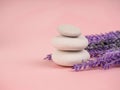 Stack of Zen stones on abstract pink background. Relax still Life with folded stones. Zen pebbles, stones, Spa-calm scenes to slow