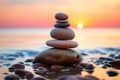 Stack of zen stones on the beach at sunset. Zen concept Royalty Free Stock Photo