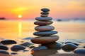 Stack of zen stones on the beach at sunset. Zen concept Royalty Free Stock Photo