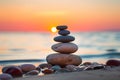 Stack of zen stones on the beach at sunset. Zen concept Royalty Free Stock Photo