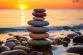 Stack of zen stones on the beach at sunset. Zen concept Royalty Free Stock Photo