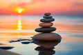 Stack of zen stones on the beach at sunset. Zen concept Royalty Free Stock Photo