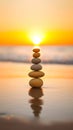 Stack of zen stones on the beach at sunset. Zen concept Royalty Free Stock Photo