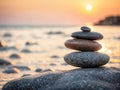 Stack of zen stones on the beach at sunset. Zen concept Royalty Free Stock Photo