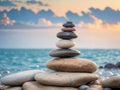 Stack of zen stones on the beach at sunset. Zen concept Royalty Free Stock Photo