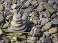 A stack of Zen stones, a close-up of pebbles stacked on top of each other, top view Royalty Free Stock Photo