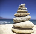 Stack of zen stones on pebble beach Royalty Free Stock Photo