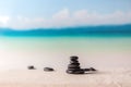 Stack of zen stones on sand beach Royalty Free Stock Photo