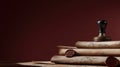 Stacked, aged parchment scrolls with wax seals, a stamp, and a dark, moody background Royalty Free Stock Photo