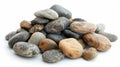 Many pebbles stacked on white surface