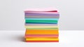 stacked array of colorful sticky notes, creating a gradient from red to orange against a white background Royalty Free Stock Photo
