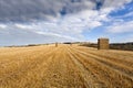 Stacked bales of straw in farmers field, Yorksire Wolds