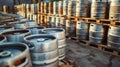 Stacked beer kegs at a brewery yard. Industrial storage photography