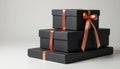 Stacked Black Gift Boxes with Copper Ribbon Royalty Free Stock Photo