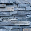 Stacked blue stone wall with rustic architectural design background texture pattern Royalty Free Stock Photo