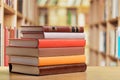 Stacked books on desk at library Royalty Free Stock Photo