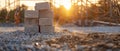 Stacked Bricks on Gravel at Construction Site with Scaffolding and Sunset Light Construction Royalty Free Stock Photo