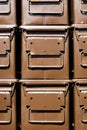 Stacked brown ammunition boxes Royalty Free Stock Photo