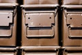 Stacked brown ammunition boxes Royalty Free Stock Photo