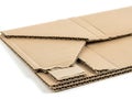 Stacked brown cardboard sheets on white surface Royalty Free Stock Photo