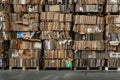 Stacked cardboard bales for recycling in industrial storage facility Royalty Free Stock Photo