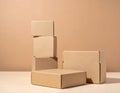 Stacked Cardboard Boxes on Beige Background Royalty Free Stock Photo