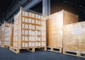 Stacked of cardboard boxes wrapped plastic film on pallet rack. shipment boxes. cargo export. warehouse storage. Royalty Free Stock Photo