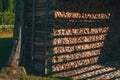 Stacked chopped firewood in farm shed for winter season Royalty Free Stock Photo