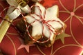 Stacked cinnamon stars packed with red and white ribbons