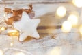 Stacked cinnamon stars on wooden background