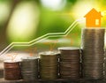 Stacked coins investment ideas saving money to build real estate