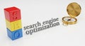 Stacked Colorful Blocks Spelling SEO Next to Compass and Text Royalty Free Stock Photo