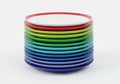 Stacked colorful plastic plates arranged in a vibrant rainbow pattern Royalty Free Stock Photo
