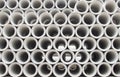 Stacked concrete pipes abstract