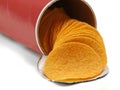 stacked crisps falling out from red cardboard tube, paprika flavoured potato chips in can isolated on white background Royalty Free Stock Photo