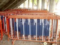 Stacked Crowd Control Barriers Stored Under Structure Royalty Free Stock Photo