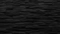 Stacked dark grey rough stone wall texture with deep shadows and sharp edges Keywords: stone, wall, stacked, dark Royalty Free Stock Photo