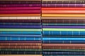 stacked dictionaries showing different colors and sizes