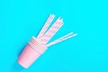 Stacked Drinking Paper Cups Striped Straws On Light Blue Background. Flat Lay Composition. Birthday Party Celebration Kids Fun